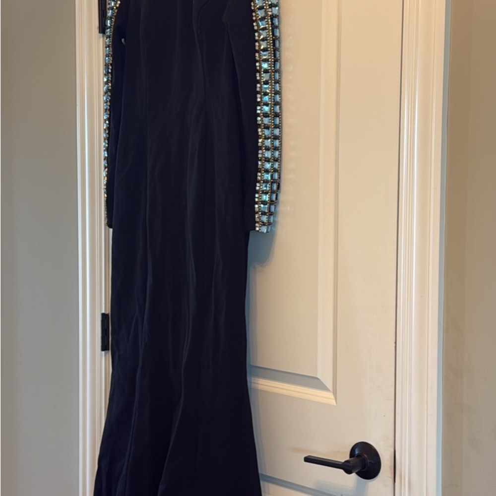 Elegant Black Gown with Embellished Sleeves